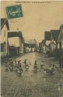 Carte postale ancienne - Sorde-l'Abbaye - La Rue Bourg-Neuf (1911)