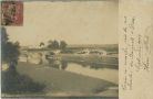 Photo ancienne - Dax - Carte photo - Passage d'un train sur le pont du chemin de fer (vue prise d'une chambre des Baignots)