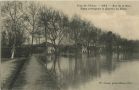 Carte postale ancienne - Dax - Crue de l'Adour - Rue de la Gare - Digue protégeant le Quartier du Sablar